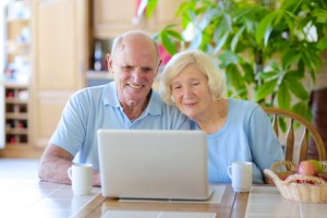 © Cromary | Dreamstime.com - Senior Couple Using Laptop At Home Photo